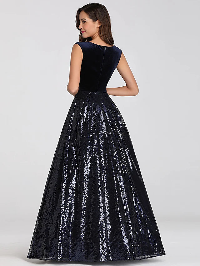 Close-up of the sequined bodice and plunging neckline of the A-line prom dress.