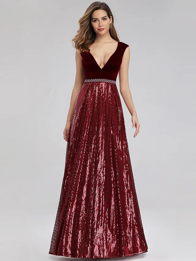 Back view of the floor-length A-line prom dress with sequin details.