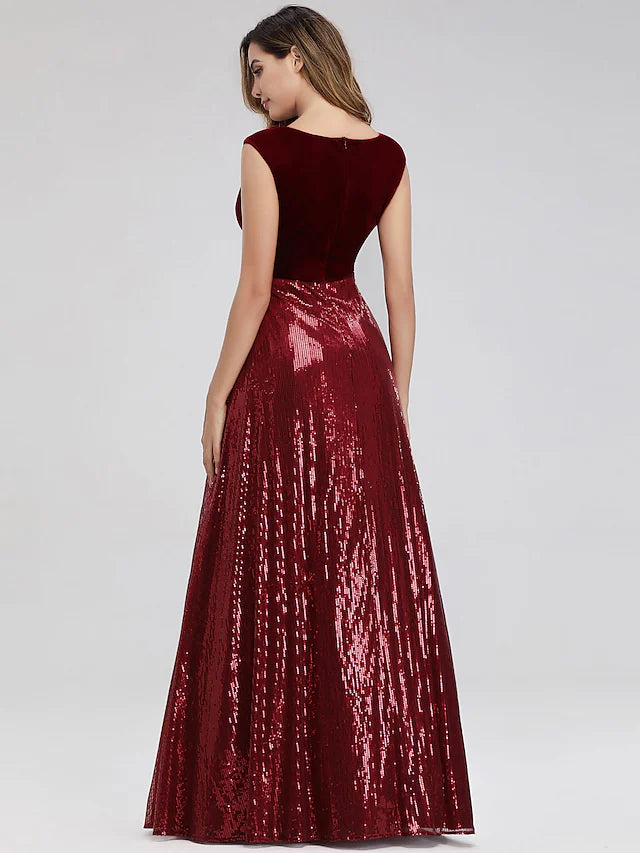 Full view of the elegant A-line prom dress, highlighting the floor-length skirt and sash.