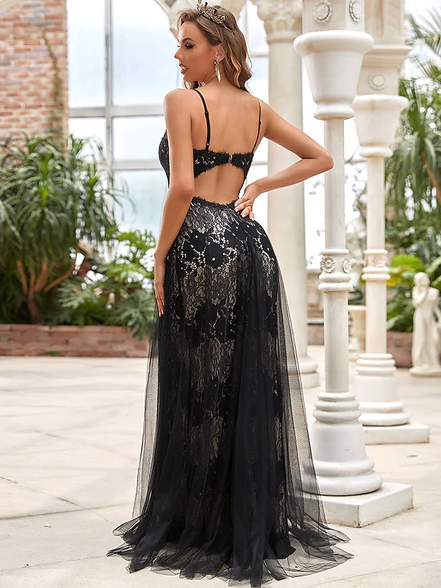 Back view of black A-Line wedding dress with floor-length tulle skirt.