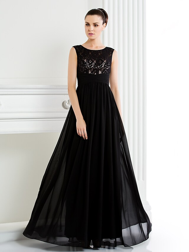 Close-up of the lace and chiffon fabric on a formal gown.