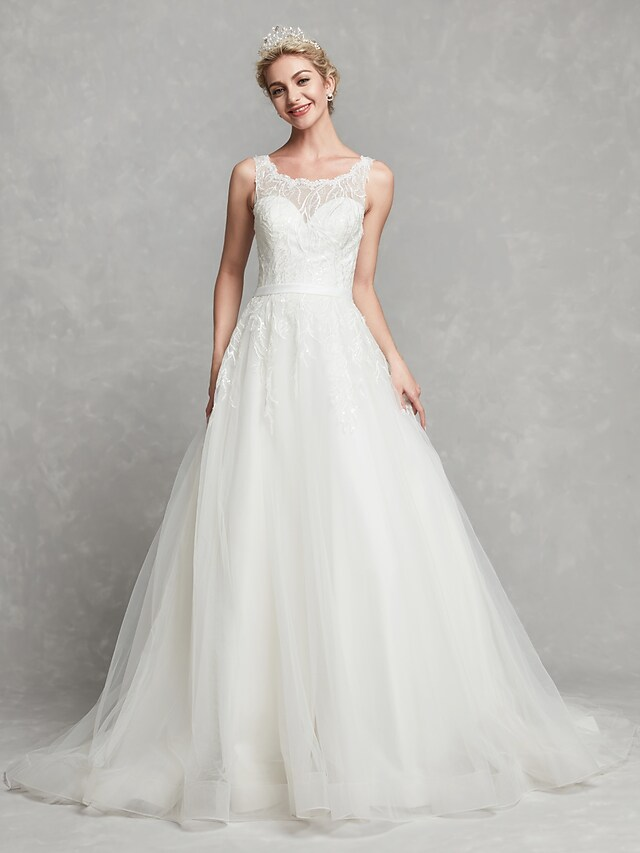 Side profile of the A-line wedding dress, highlighting the chapel train.