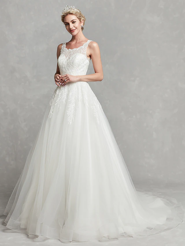 Full length view of the white A-line wedding dress with regular straps.