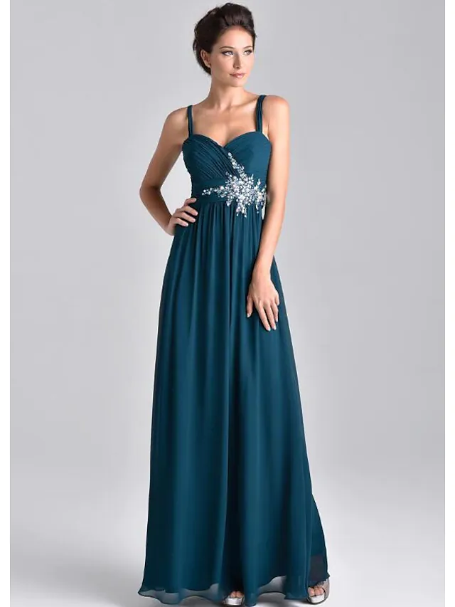 Back view of the floor-length A-line Mother of the Bride dress, showcasing its elegant silhouette.