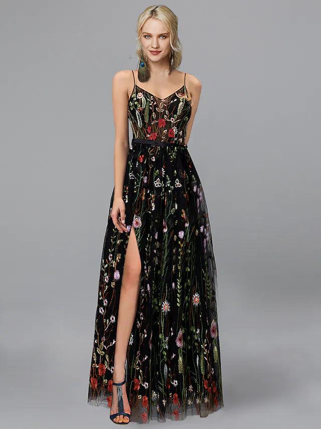 Elegant A-line chiffon prom dress with spaghetti straps, floor-length skirt, side slit, and floral appliques.