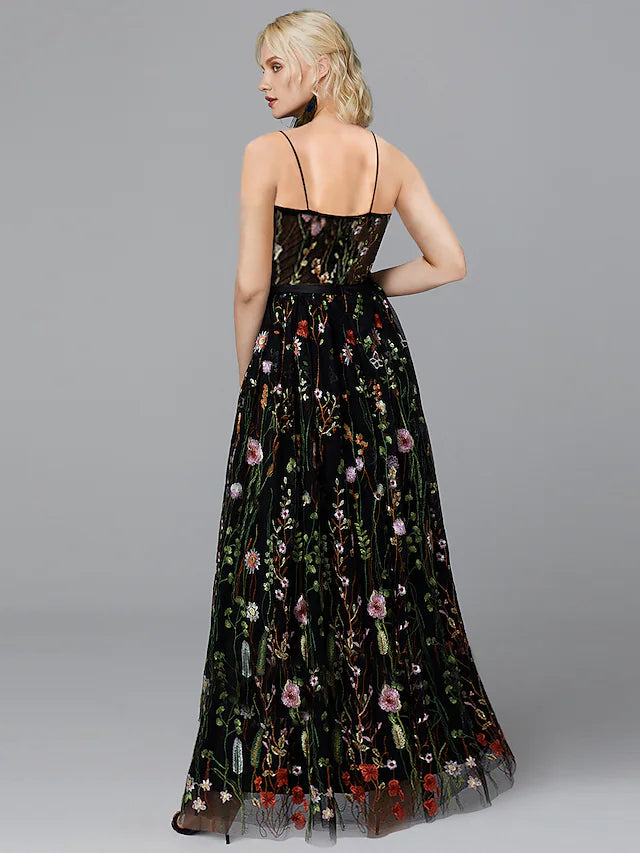 Close-up of the elegant A-line chiffon dress, highlighting delicate appliques and spaghetti straps.