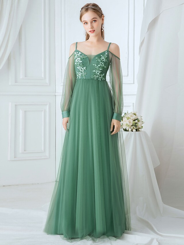 Back view of the elegant A-line bridesmaid gown, highlighting the flowing tulle skirt.
