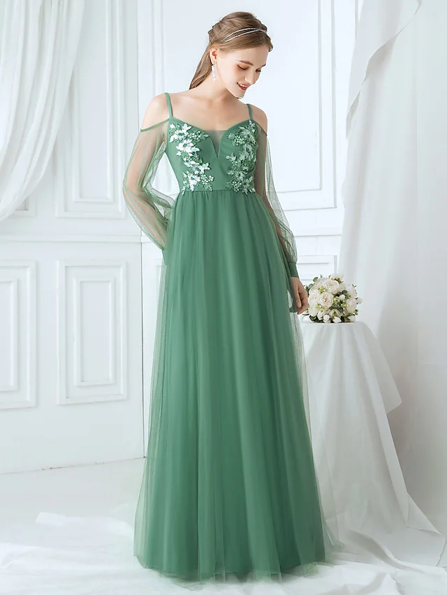 Side view of the A-line bridesmaid dress, showcasing its graceful silhouette and applique embellishments.