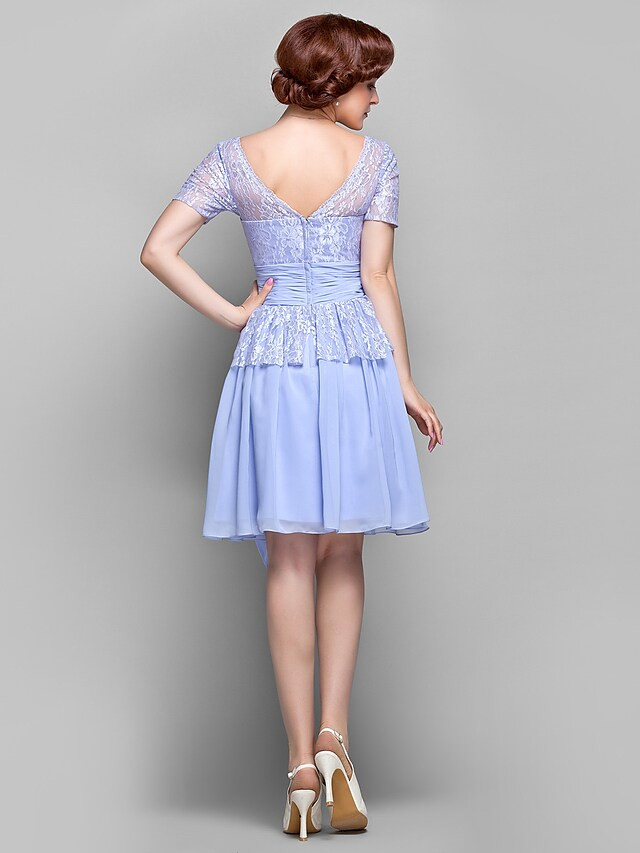 Side profile of the knee-length formal dress.