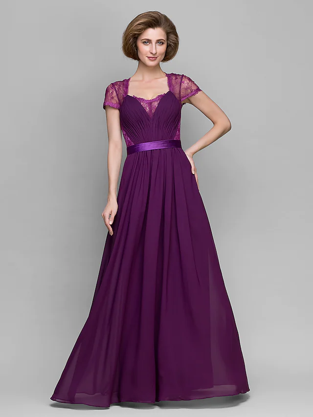 Side profile of the floor-length A-Line Mother of the Bride dress.