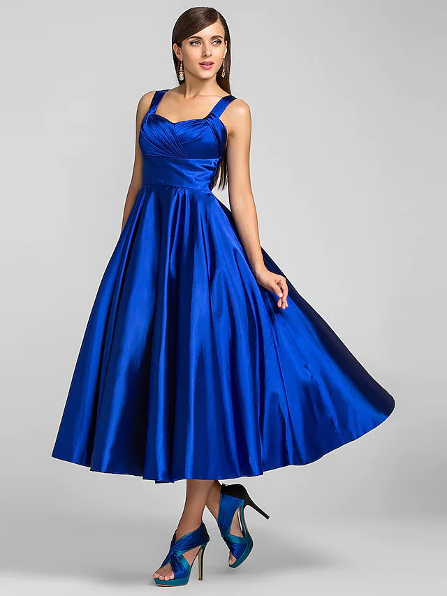 Back view of the A-line dress featuring criss-cross straps.