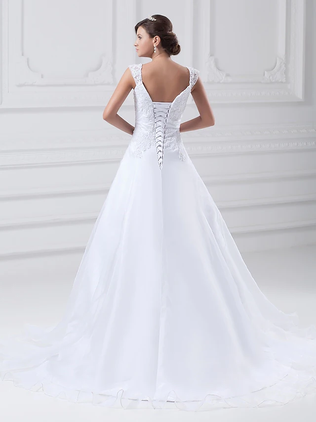 Side view of A-Line wedding gown with regular straps.
