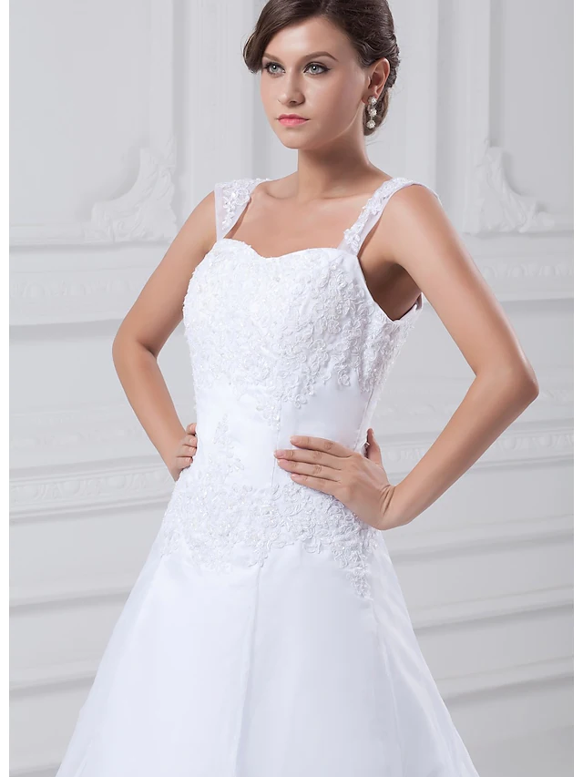 Front angle of a square neck A-Line bridal gown.