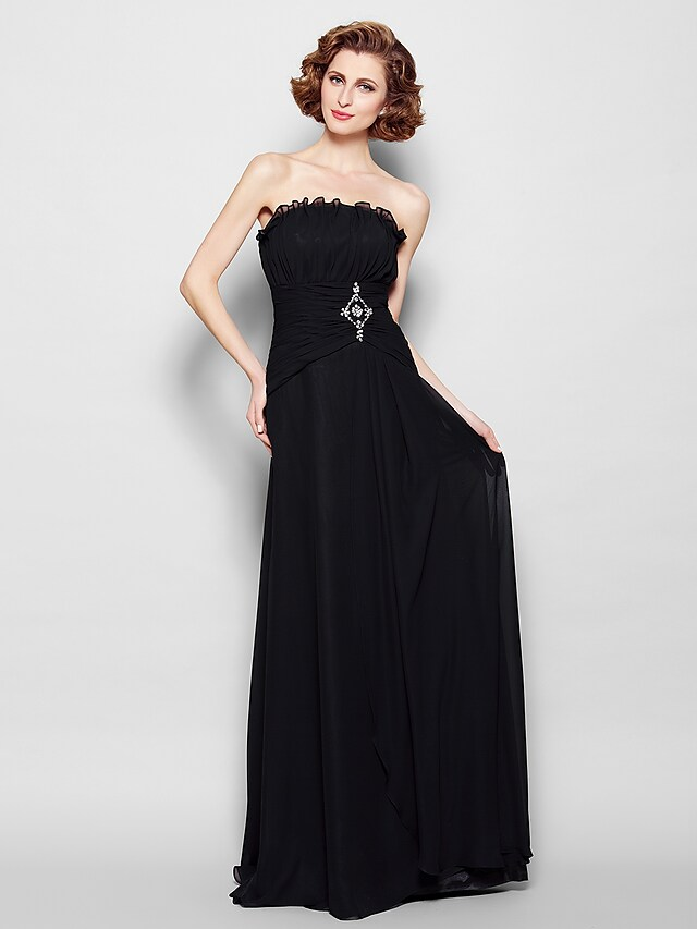 Front view of an elegant A-Line strapless chiffon Mother of the Bride dress with ruched details and beading.