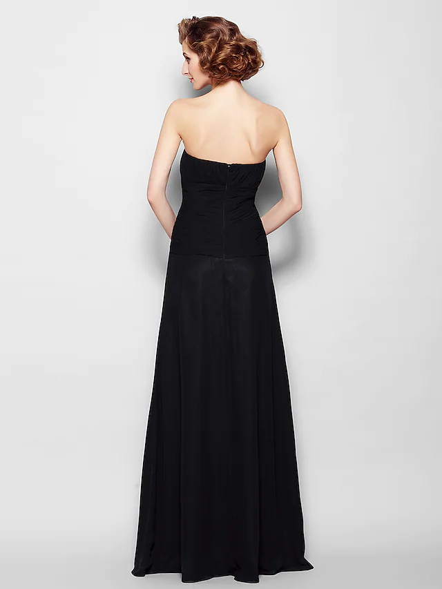 Side view of the A-Line strapless chiffon Mother of the Bride dress, showcasing the flowing floor-length skirt.