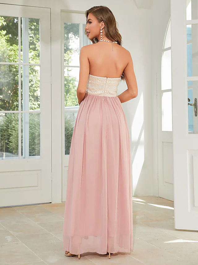 Close-up of floral appliques on an A-line chiffon dress.