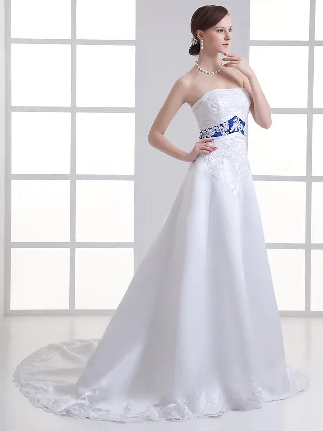 Back view of an A-Line strapless wedding dress showing the court train.