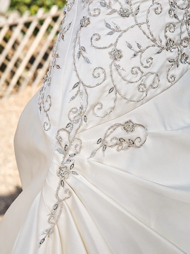 Elegant A-line strapless satin wedding dress with chapel train.