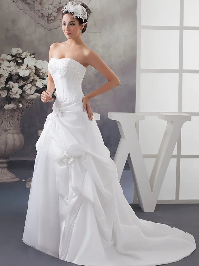 Back view of A-Line wedding dress showing court train.