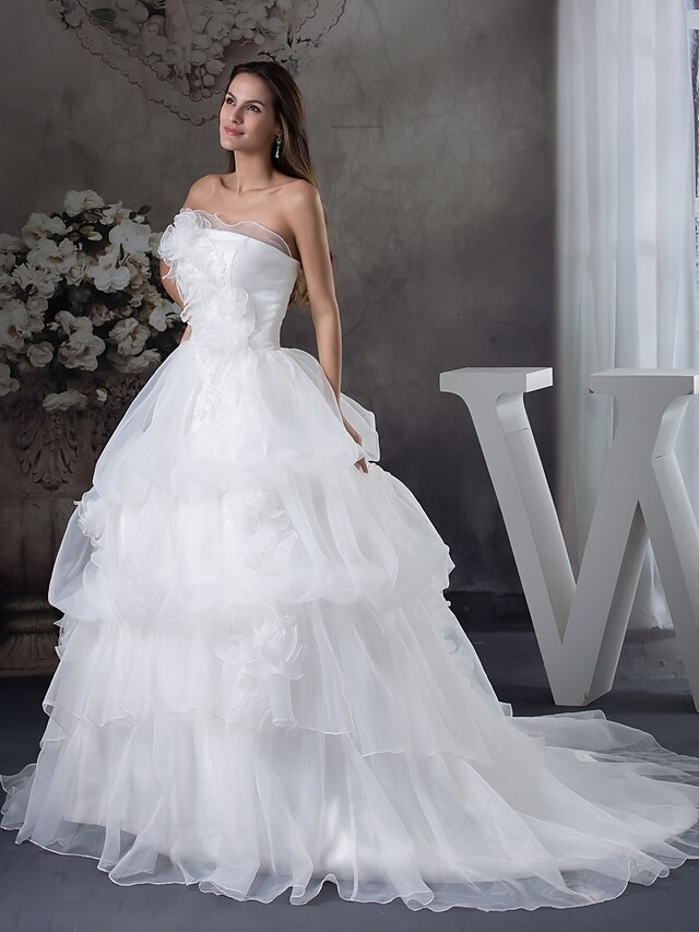 Back view of A-Line strapless wedding dress with chapel train.
