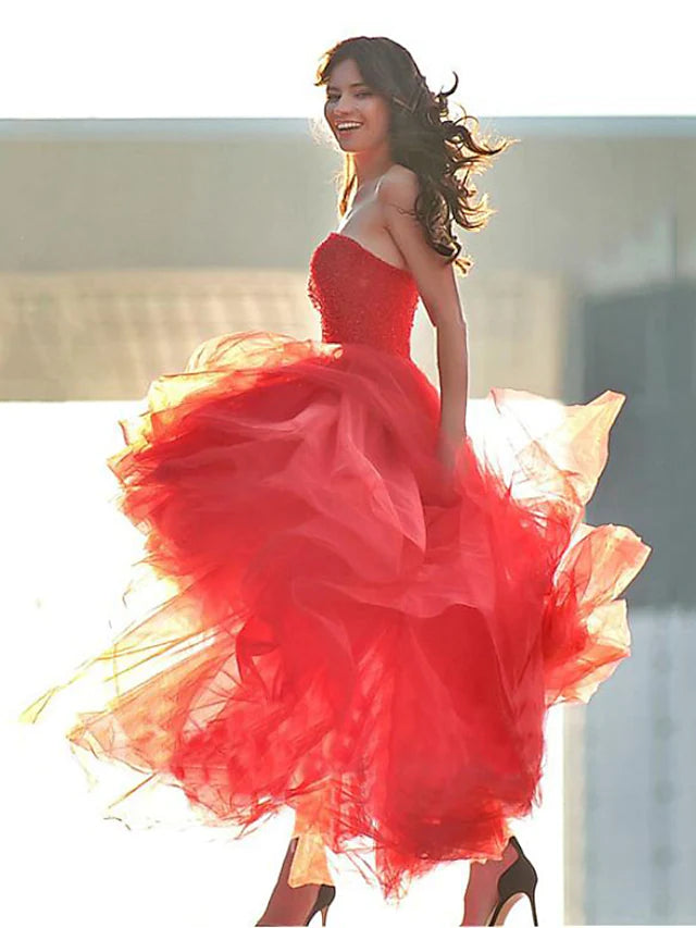 Close-up of the sweetheart neckline and pleated detail on the dress.