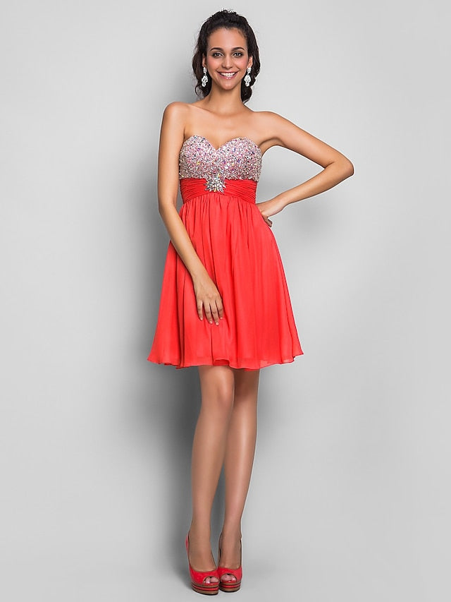 Back view of a crystal-beaded A-line wedding guest dress.