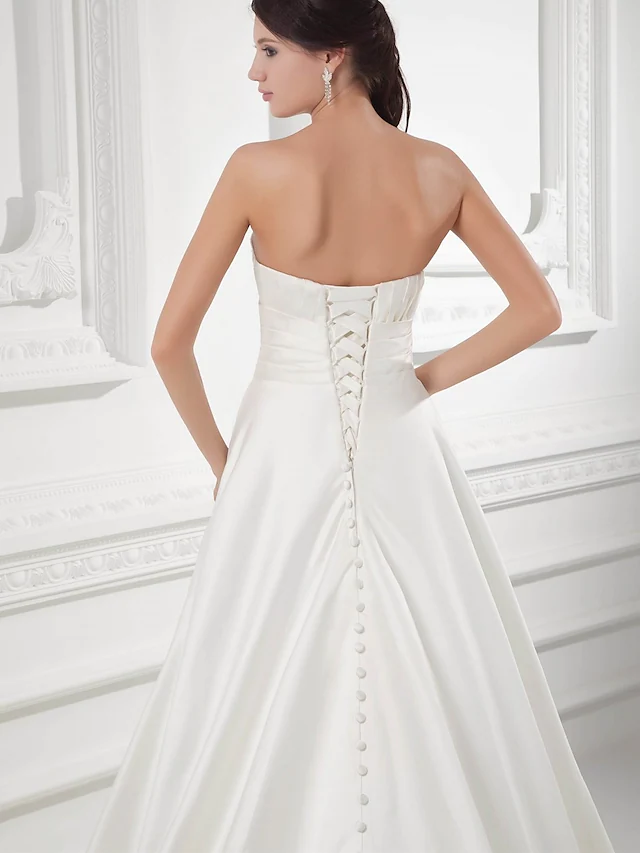 Sweetheart neckline and bodice detail of A-Line bridal dress.