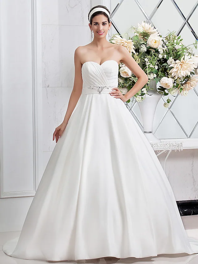Front view of a Princess A-Line satin wedding dress with sweetheart neckline.