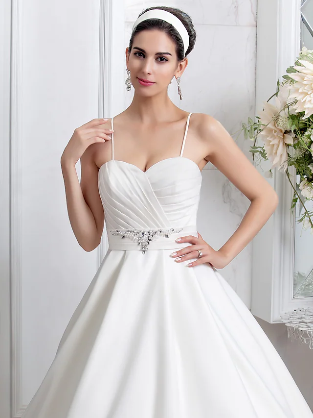 Full length view of the Princess A-Line wedding dress with a flowing skirt.