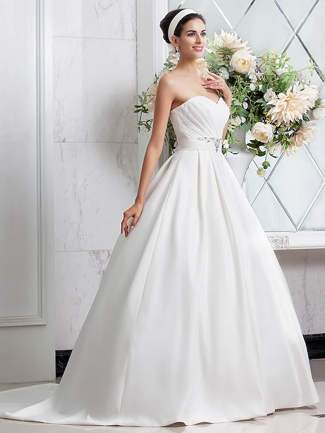 Bridal gown featuring a sweetheart bodice and A-line silhouette.