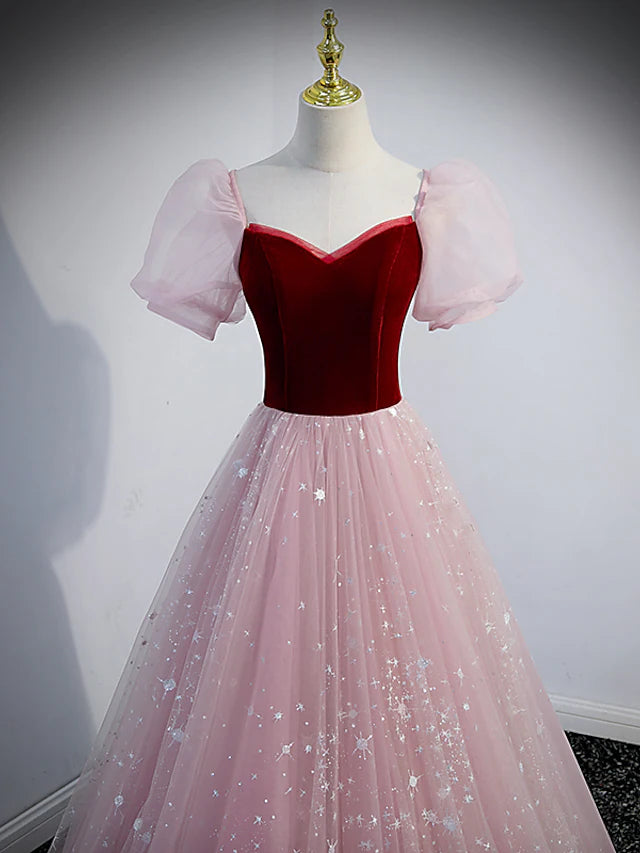 Close-up of sequin and tulle fabric on a prom dress.