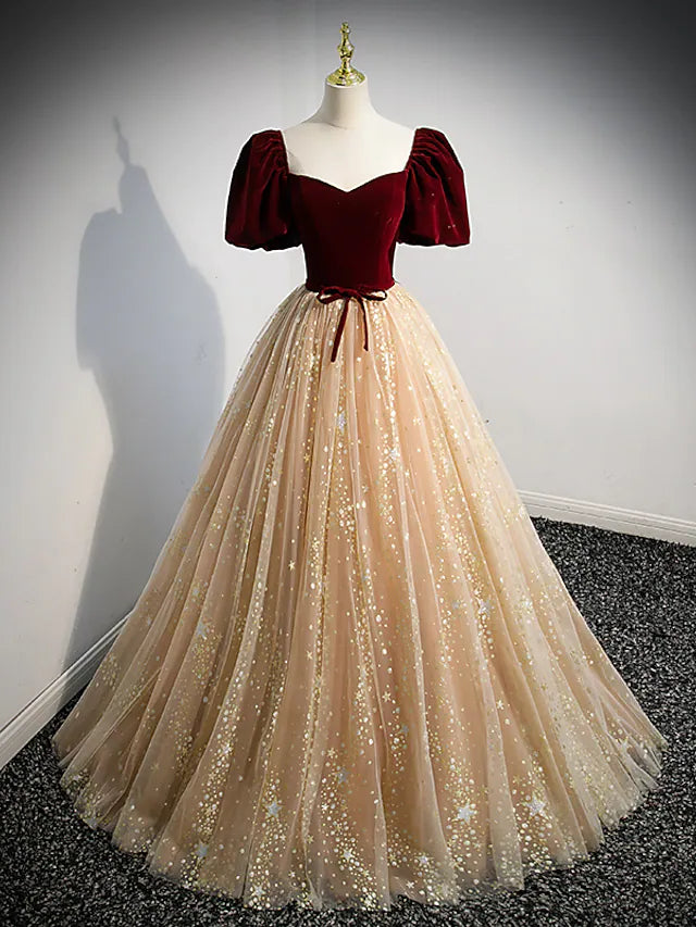 Full view of the elegant A-line prom gown with sweetheart neckline, short sleeves, and sparkling sequin tulle.