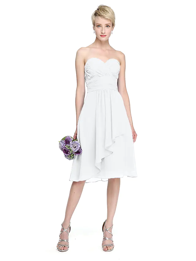 Elegant A-Line sweetheart neckline knee length chiffon bridesmaid dress with criss cross ruched draping and open back.