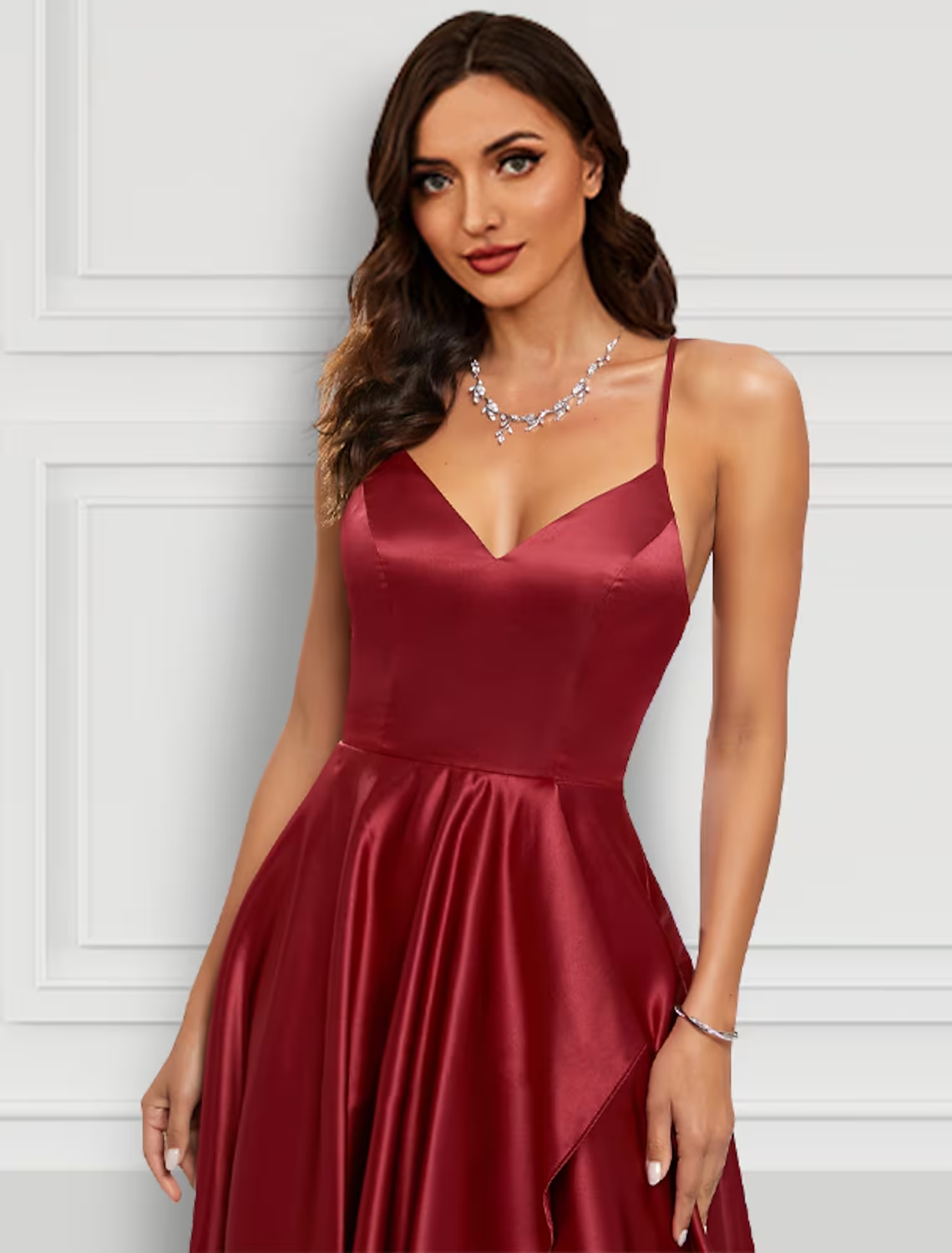 Back view of A-line formal dress showing asymmetrical ruffles.