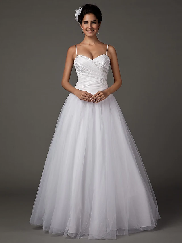 Front view of an A-Line wedding dress with sweetheart neckline and spaghetti straps.