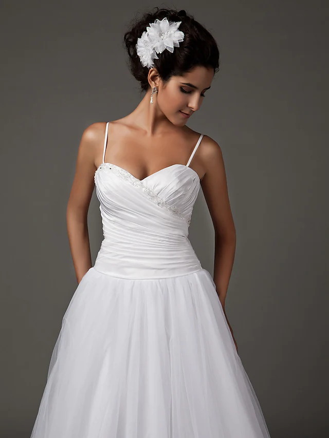 Detail of the taffeta and tulle fabric on the A-Line wedding dress.