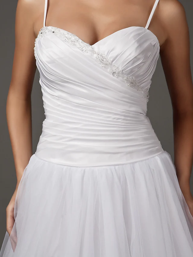 Bride wearing the A-Line wedding dress, showcasing its silhouette.