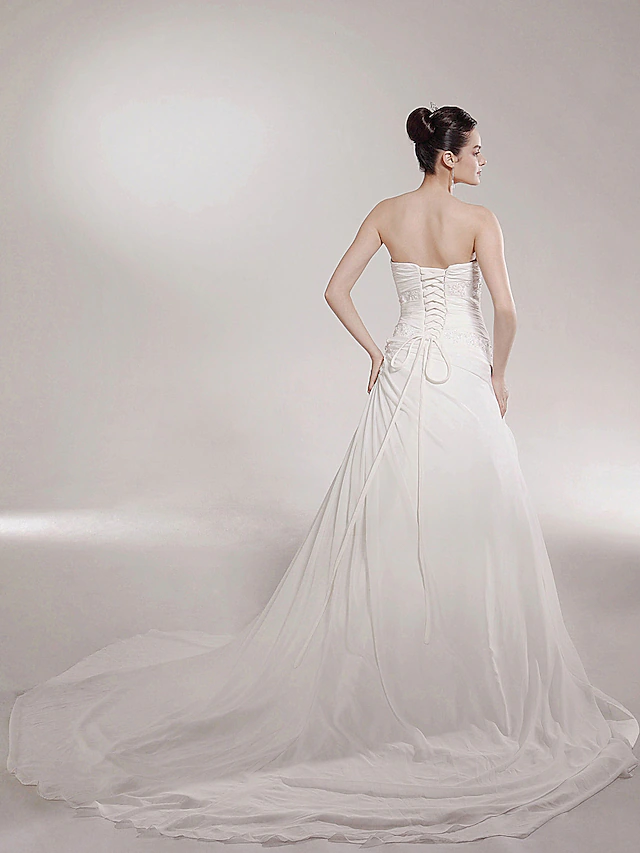 Close-up of sweetheart neckline on a bridal gown.