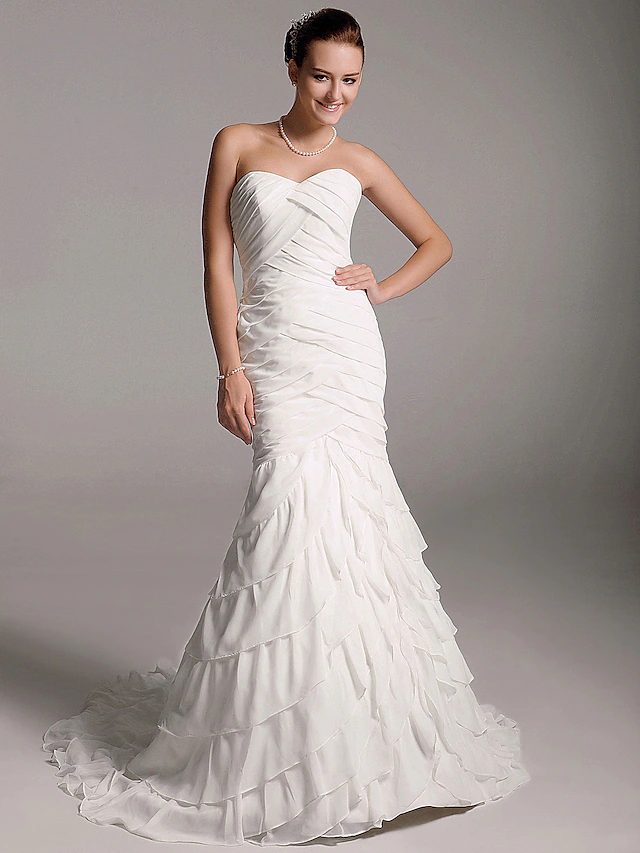 Elegant A-Line wedding dress with sweetheart neckline and court train.