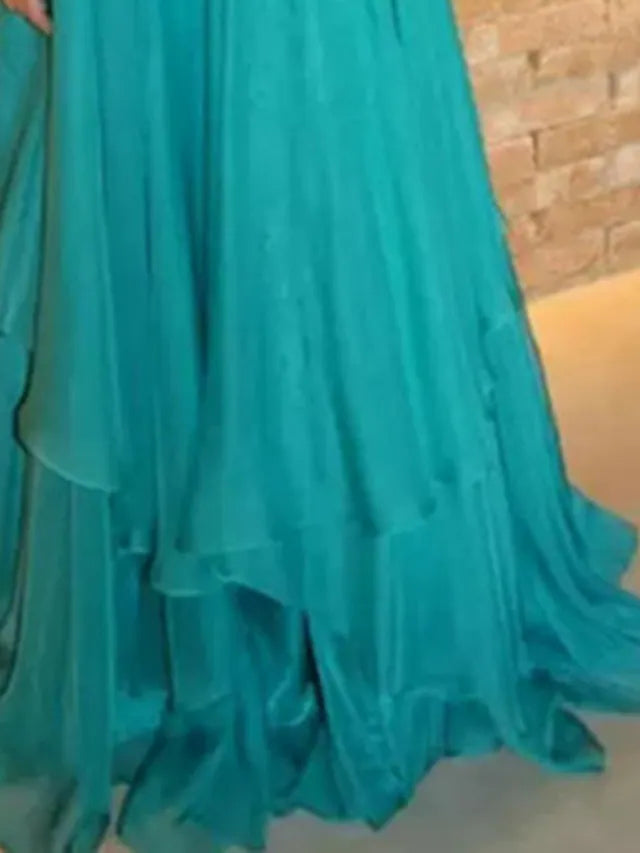Close-up of rhinestone detailing on the jewel neck A-Line dress.