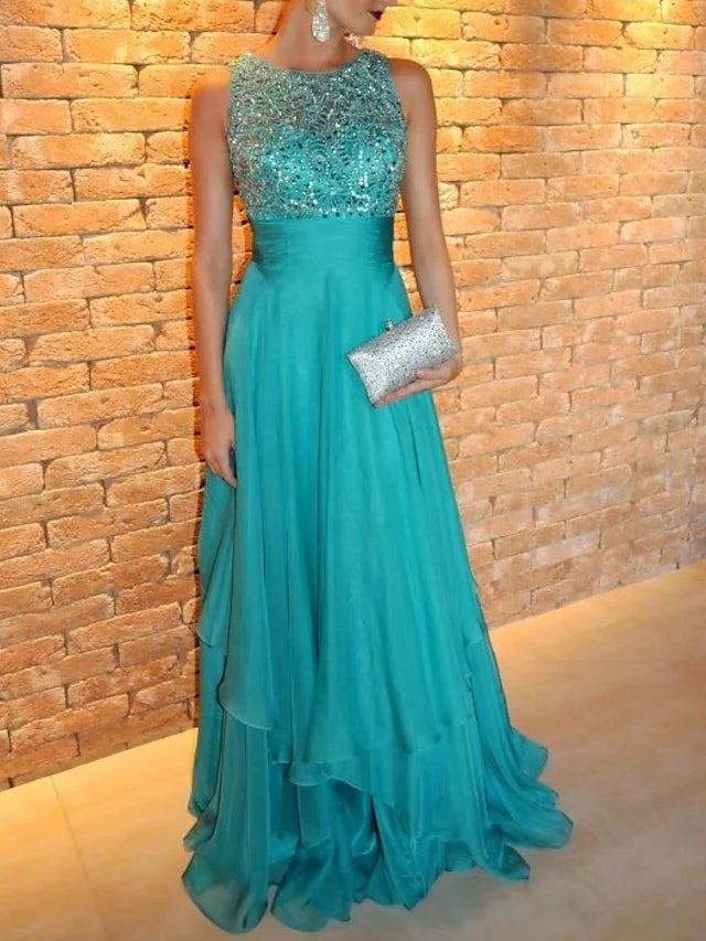 Full length view of the tiered prom dress in chiffon.
