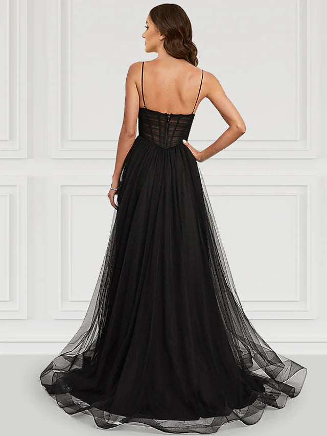 Close-up of the bodice and spaghetti straps on the A-line prom dress.