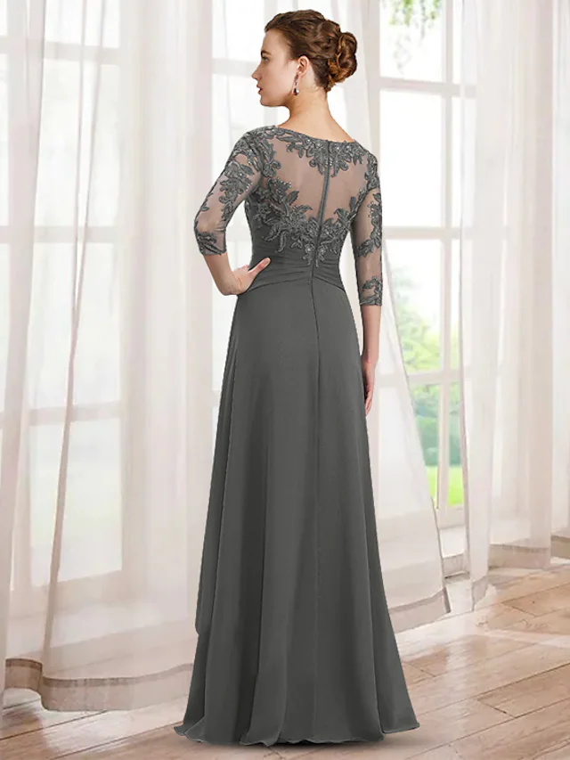 Full view of the floor-length chiffon mother of the bride dress featuring ruffles and delicate lace.