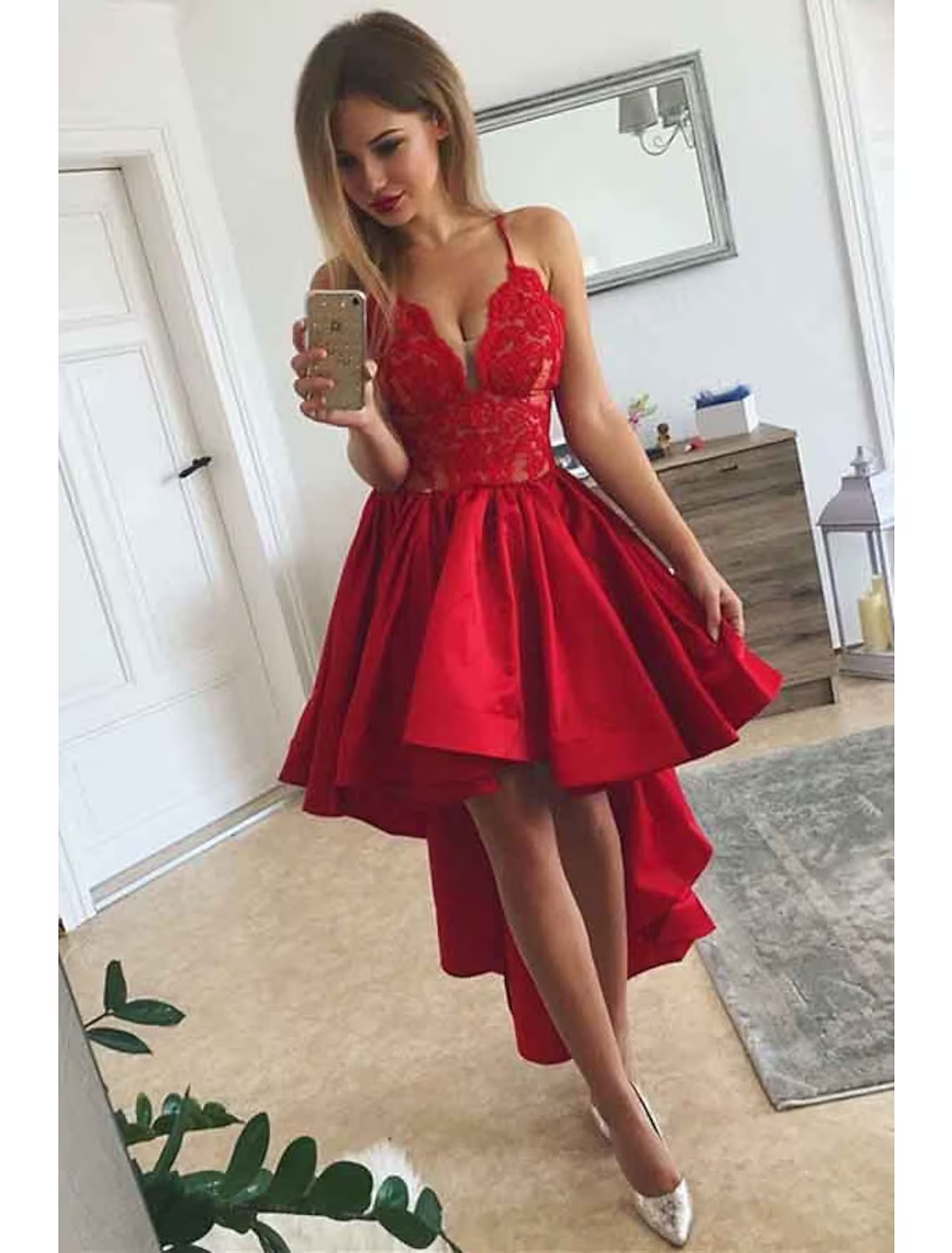 Back view of the A-line V-neck satin dress, highlighting the flowing asymmetrical hem.