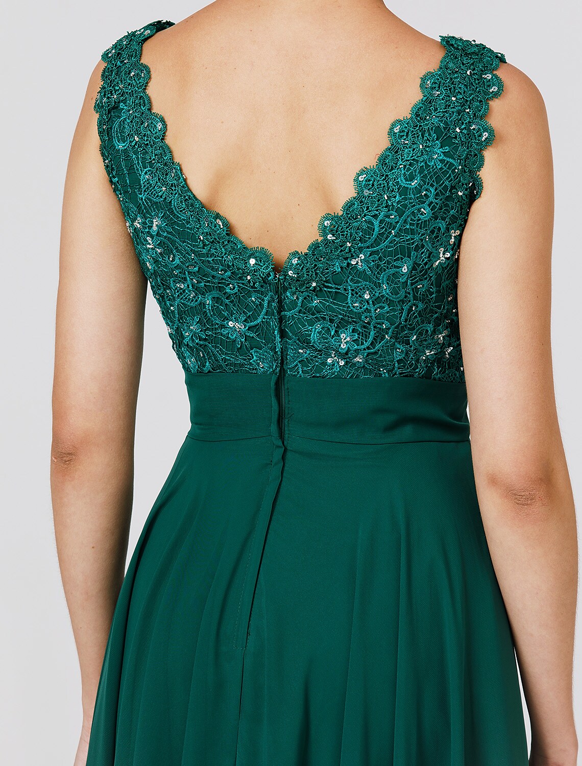 Model wearing A-line V-neck formal chiffon dress.