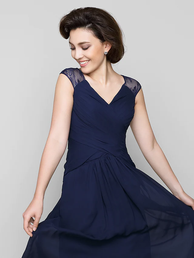Full length view of the elegant A-Line Mother of the Bride gown.