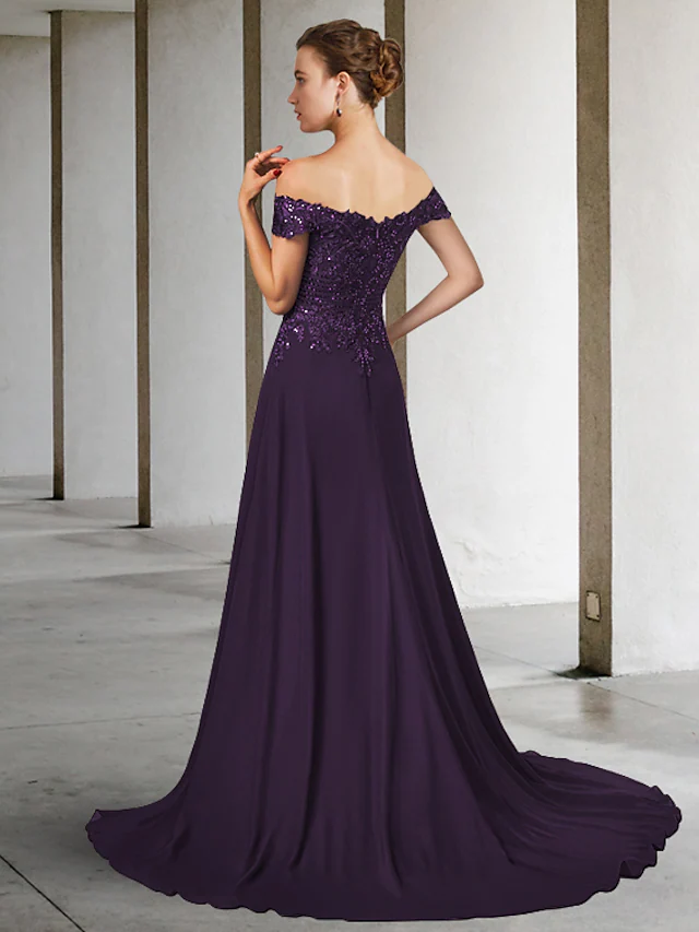 Back view of the A-line chiffon lace dress with intricate appliques.