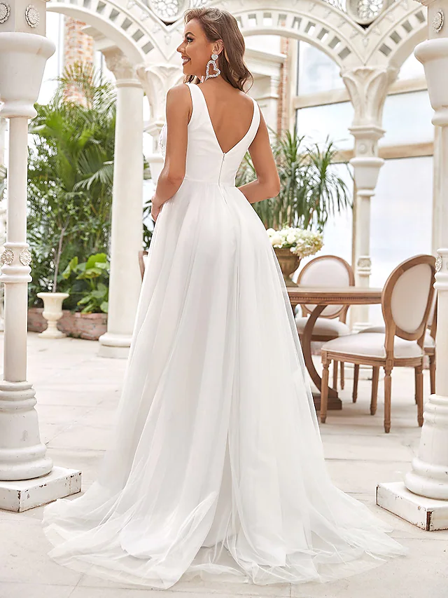 Back view of the A-Line wedding dress, showing the flowing tulle skirt.