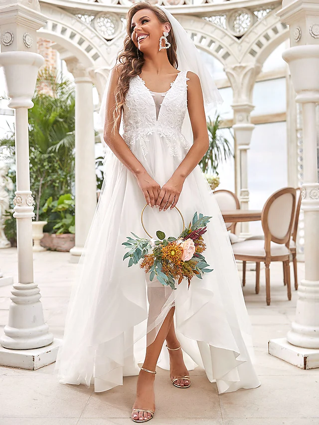 Full view of the elegant A-Line wedding gown, highlighting its romantic silhouette.