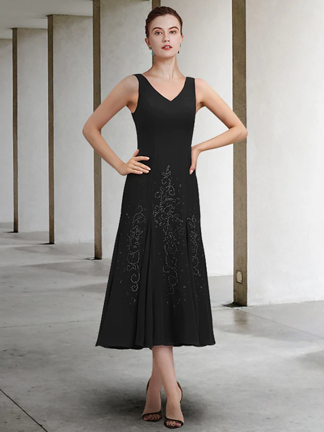 Elegant A-Line Mother of the Bride dress with V-neck and beading.
